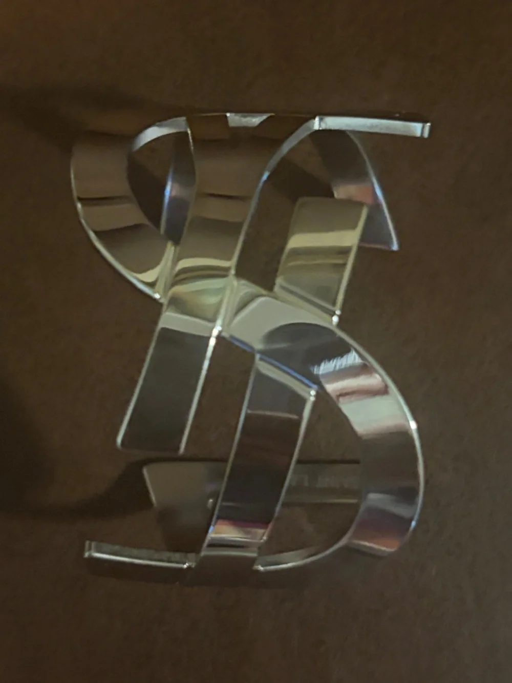 Yves Saint Laurent statement metal